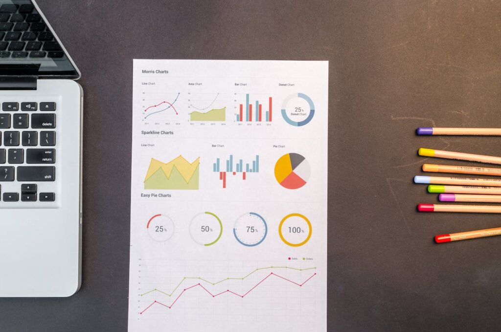Charts On Black Wooden Table